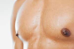 What Are the Different Types of Top Surgery? 2 sweaty muscular chest