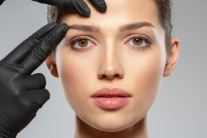 What Is an Endoscopic Brow Lift? 1 woman gets her brows lifted