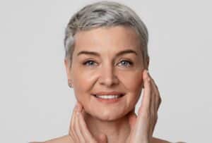 What Is a Deep Plane Facelift? 1 grey haired woman portrait